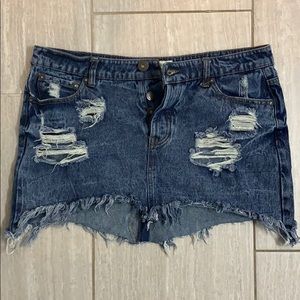 Ripped jean mini skirt